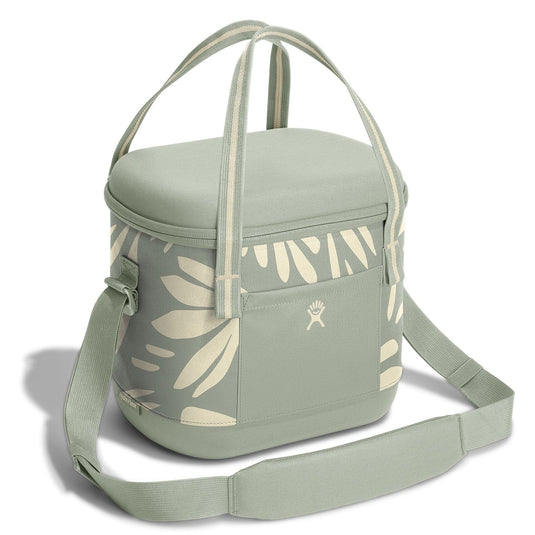 Green cooler bag with leaf pattern on a white background