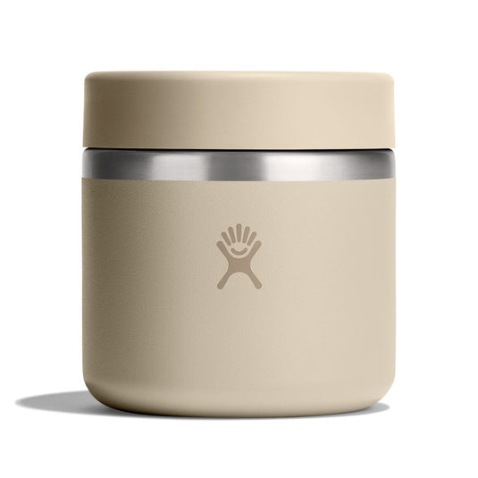 Beige insulated container with silver lid on a white background