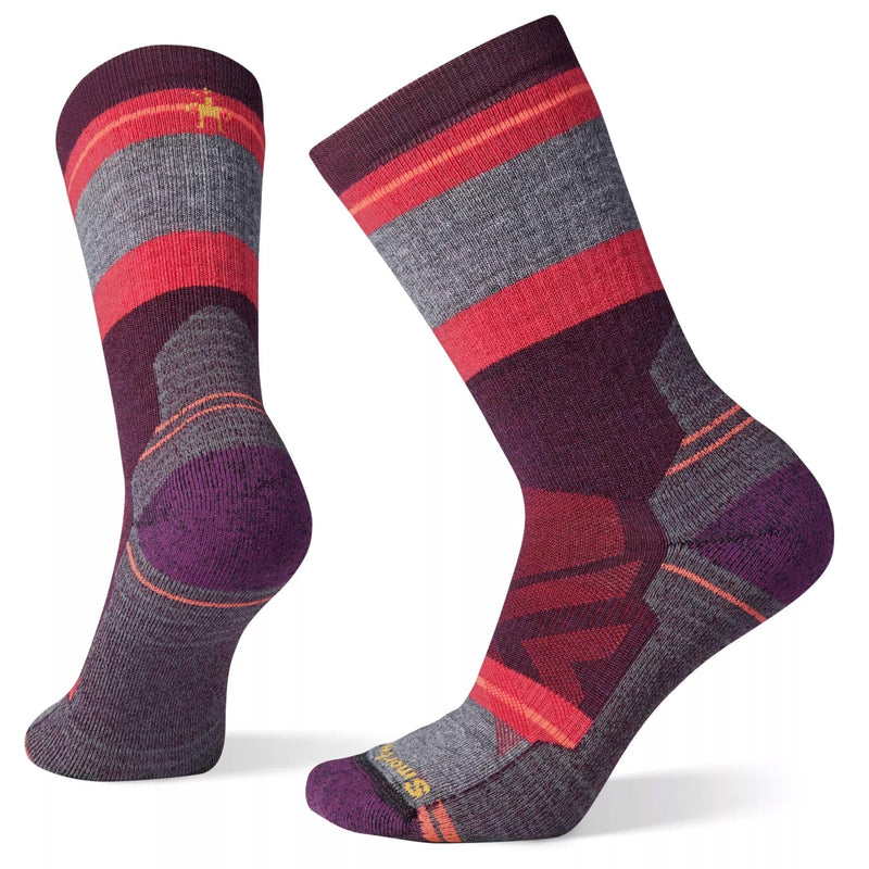 Load image into Gallery viewer, A pair of Smartwool women's hike crew socks with a geometric pattern in shades of purple, red, and gray.
