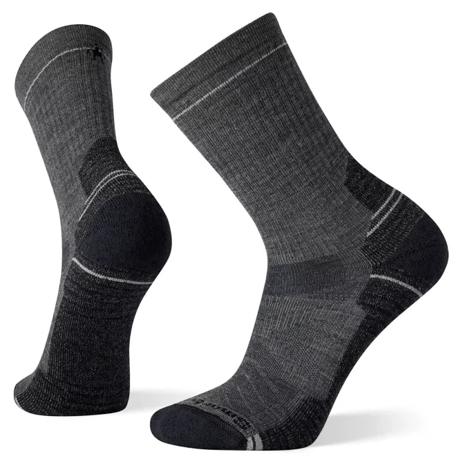Load image into Gallery viewer, A pair of SmartWool Hike Light Cushion Crew socks in red and black, featuring a crew length and mesh zones on the side.
