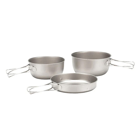 Set of three stainless steel cookware pots on a white background