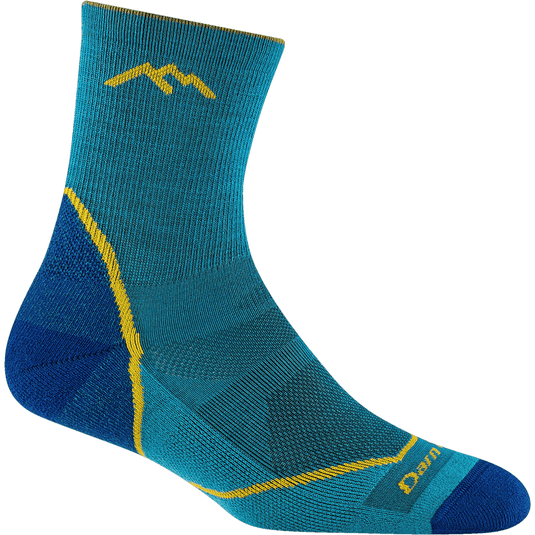 Blue and yellow sock with mountain design on a white background