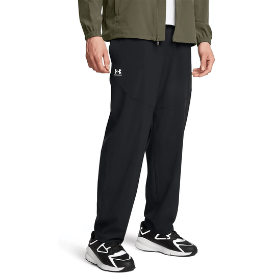 Person wearing black pants with a brand logo on a white background