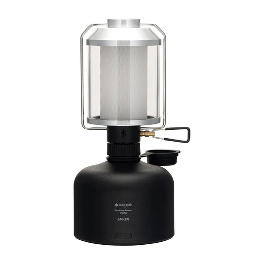 Black camping lantern with clear glass罩on a white background