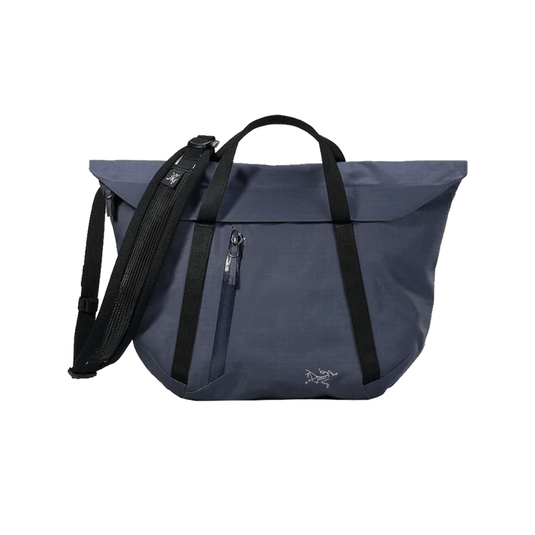 Blue bag with black straps on a white background