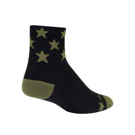 Black sock with beige star patterns on a white background