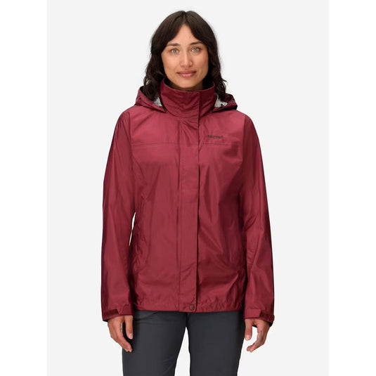 Woman wearing a red raincoat on a white background