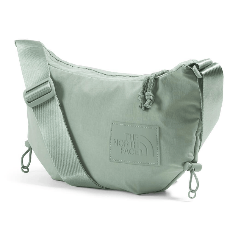 Load image into Gallery viewer, Light green shoulder bag with The North Face logo on a white background
