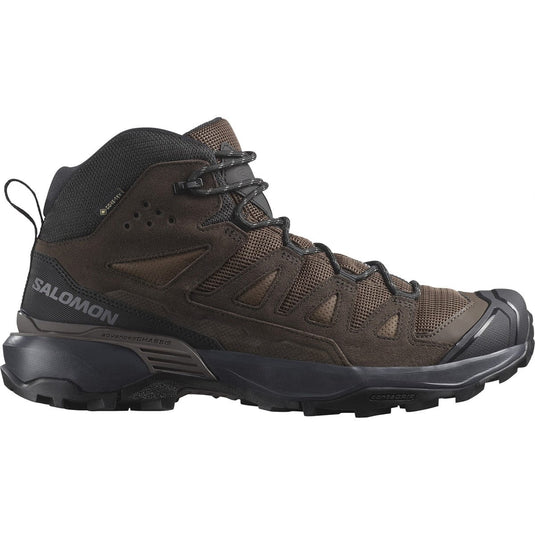 Brown hiking boot with black sole on a white background