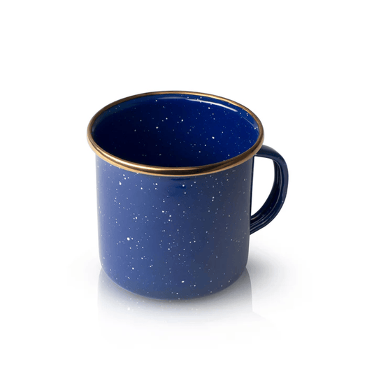 Blue speckled mug with gold rim on a white background