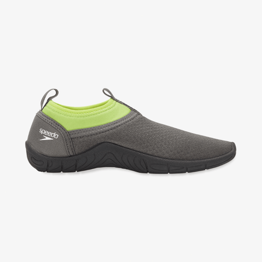 Black athletic shoe with white sole on a white background