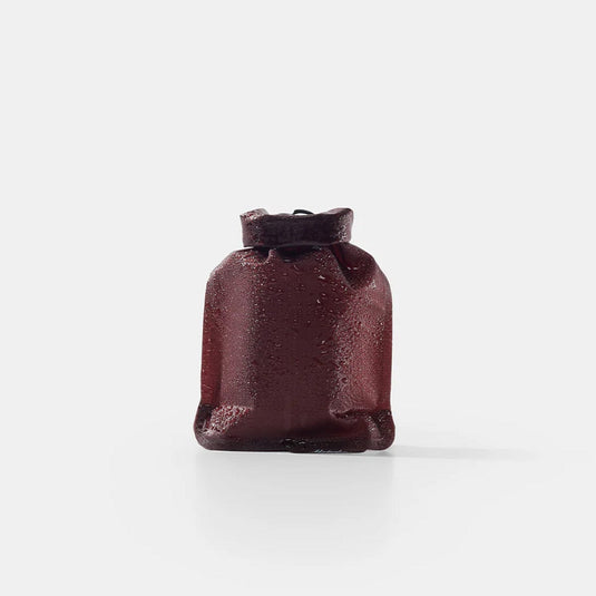 Brown drawstring bag on a white background