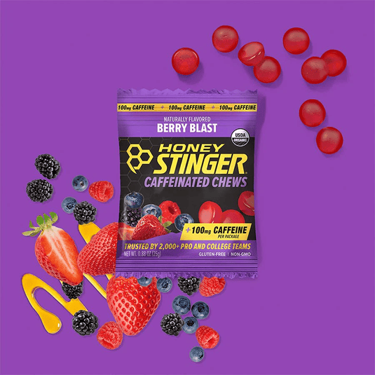 Honey Stinger caffeinated chews package with berry blast flavor on a purple background