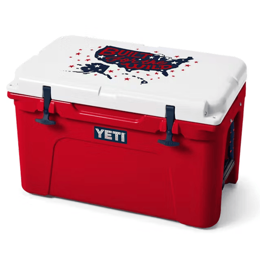 Red and white cooler with 'Built for the Wild' design and YETI logo.