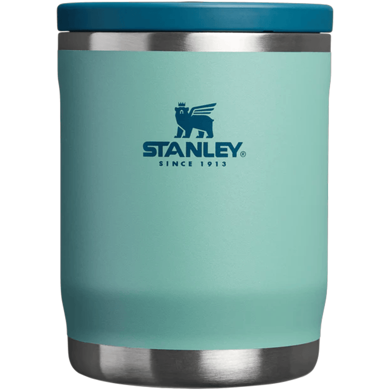 Load image into Gallery viewer, Turquoise Stanley tumbler with a blue lid on a white background
