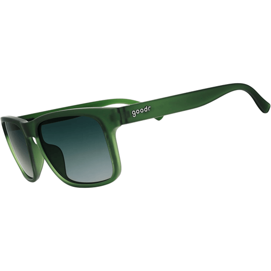 Green sunglasses with a gradient lens on a white background