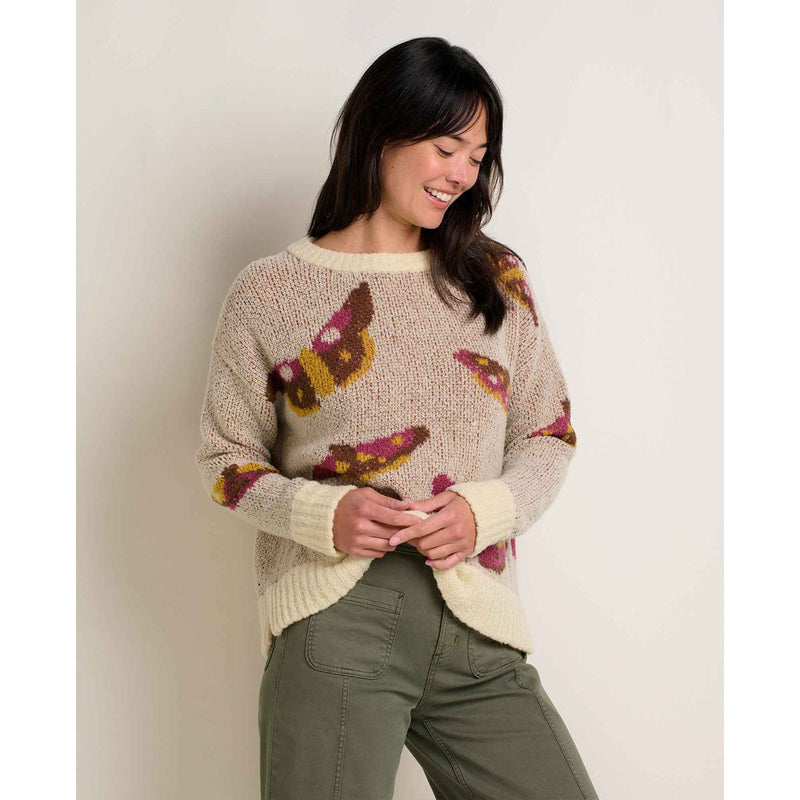 Load image into Gallery viewer, Woman wearing a sweater with butterfly patterns against a plain background
