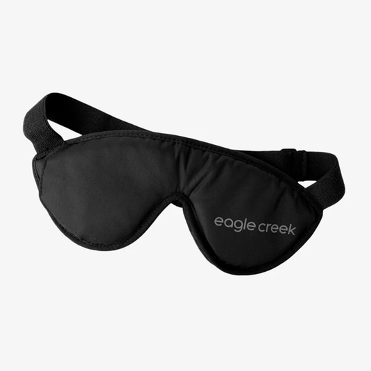 Black sleep mask with 'eagle creek' branding on a white background