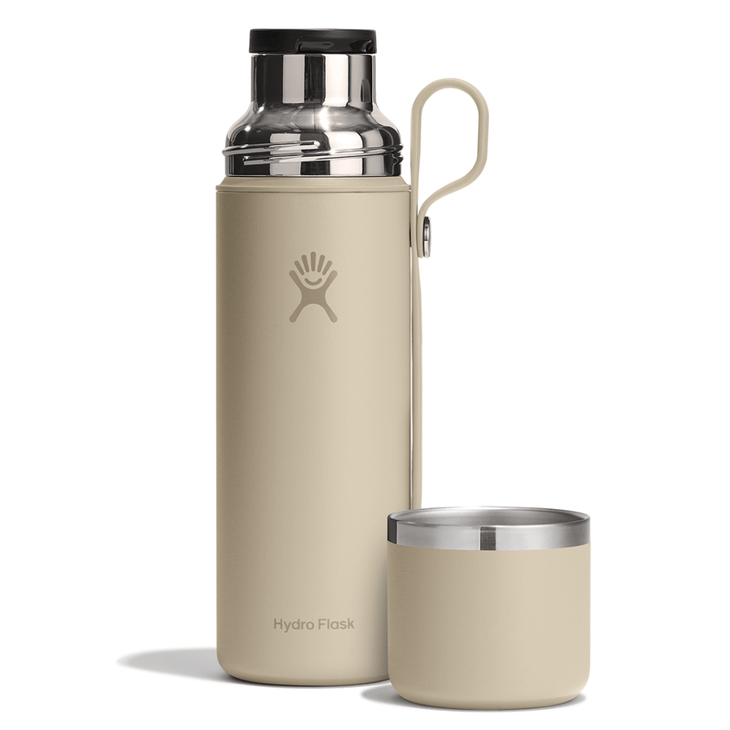 Load image into Gallery viewer, Beige Hydro Flask water bottle with matching cup on a white background
