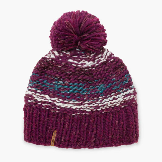 Knitted beanie with a pom-pom on a white background