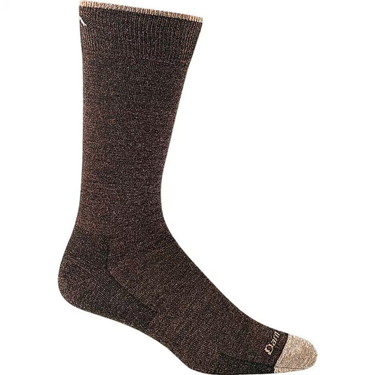 A pair of black Darn Tough crew socks designed for men, showing the side profile of the socks with the brand logo visible.