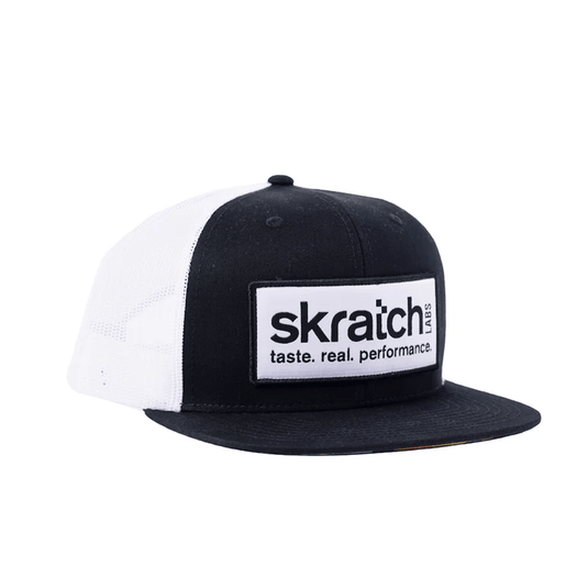 Black and white cap with Skratch Labs logo on a white background