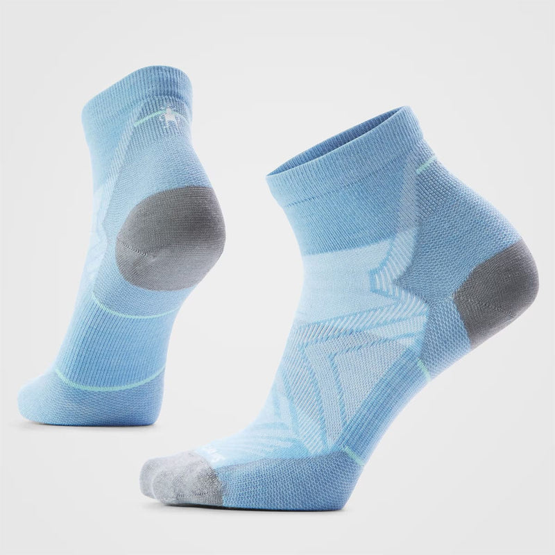 Load image into Gallery viewer, Pair of light blue socks with gray toes and heels on a light gray background
