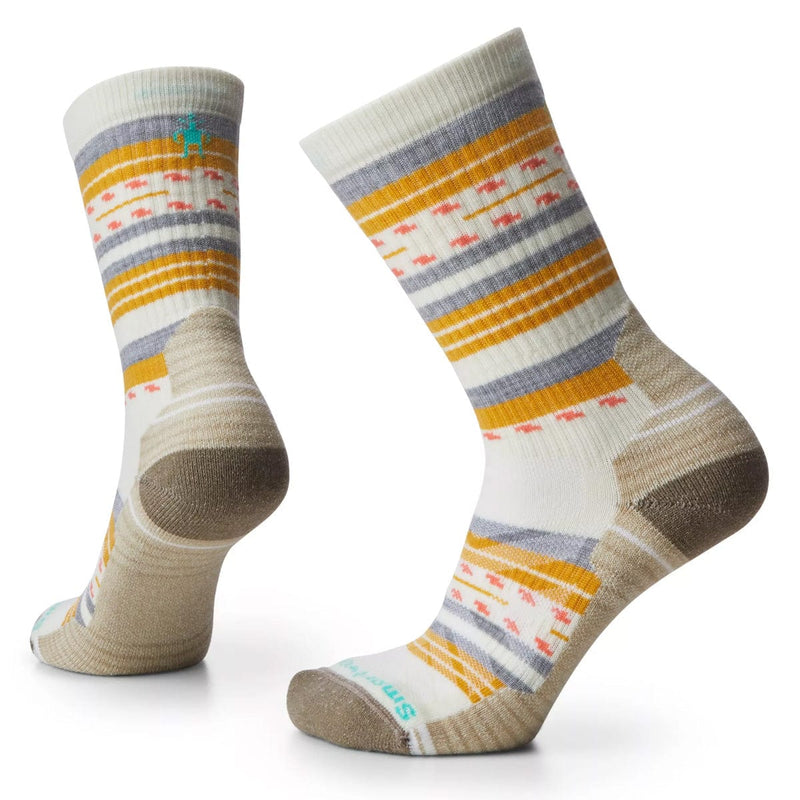 Load image into Gallery viewer, A pair of Smartwool women's crew socks with a striped pattern featuring a mix of beige, purple, and gray colors, and a small, decorative pattern design.
