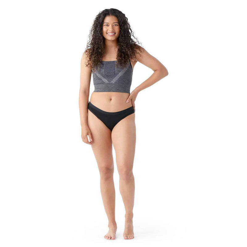 Load image into Gallery viewer, Woman wearing a gray crop top and black bikini bottoms on a white background
