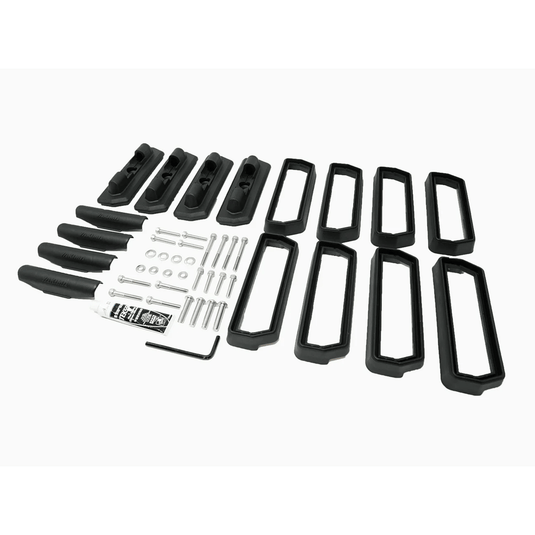 Set of black metal brackets and hardware on a white background