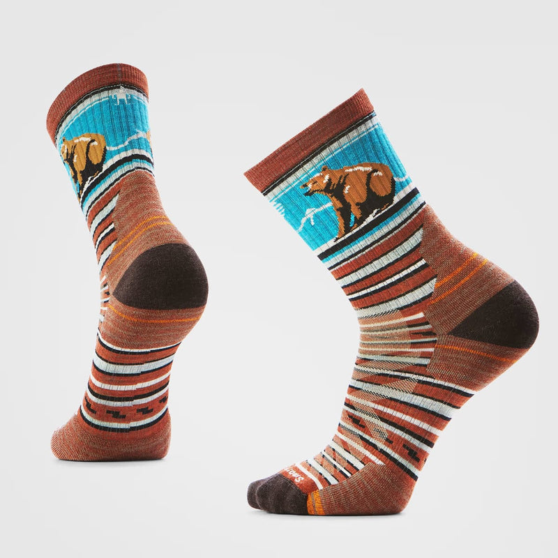 Load image into Gallery viewer, Pair of socks with bear design on a light gray background
