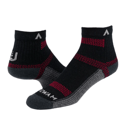 Black and gray ankle socks with red accents on a white background
