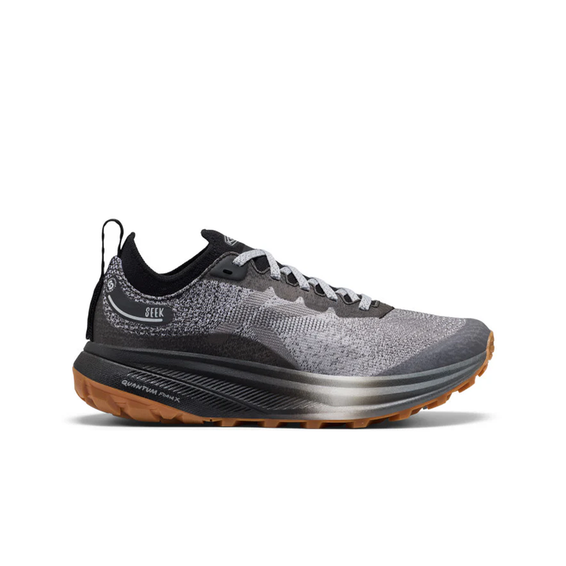 Load image into Gallery viewer, Gray and black running shoe with brown sole on a white background
