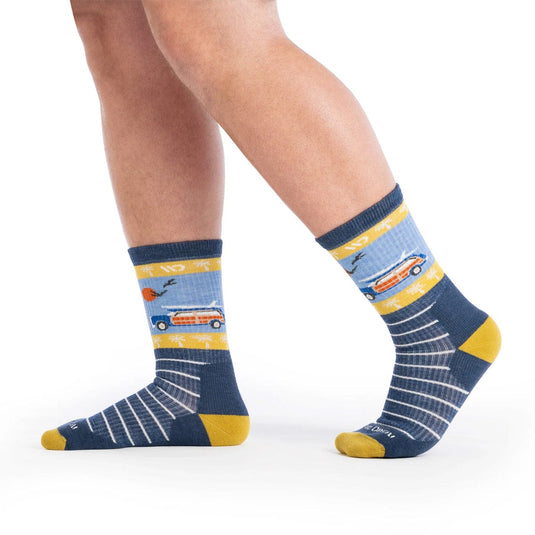 Blue socks with yellow accents and vehicle patterns on a white background