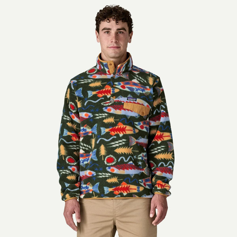 Load image into Gallery viewer, Man wearing a colorful patterned pullover with a visible brand logo on a white background
