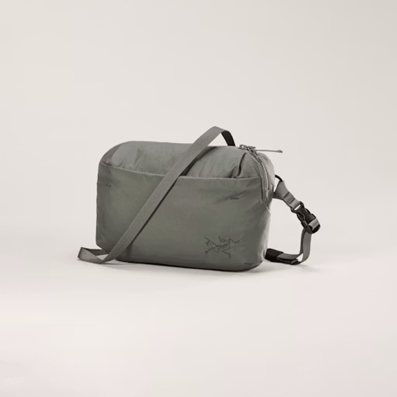 Load image into Gallery viewer, Gray shoulder bag with a brand logo on a light gray background
