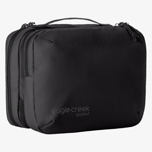 Black travel packing cube with 'eagle creek' branding on a white background