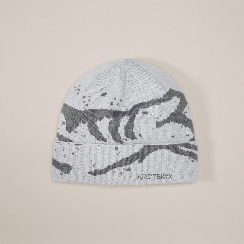 Load image into Gallery viewer, Gray beanie with black pattern and Arc'teryx logo on a beige background
