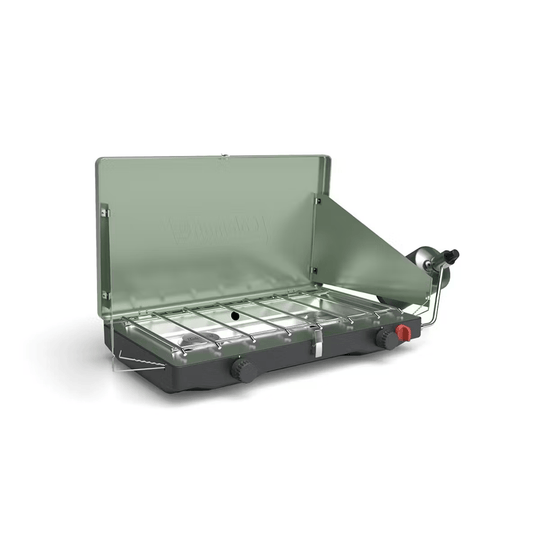 Portable camping stove with green lid on a white background