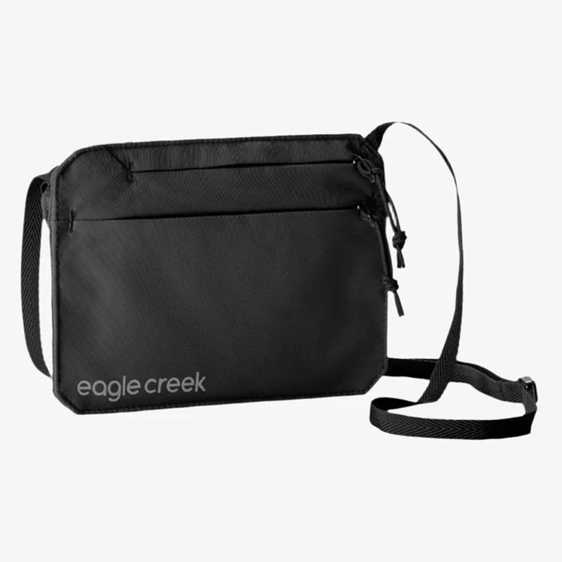 Load image into Gallery viewer, Black crossbody bag with 'eagle creek' branding on a white background
