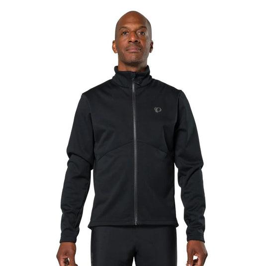 Man wearing a black jacket with a brand logo on a white background