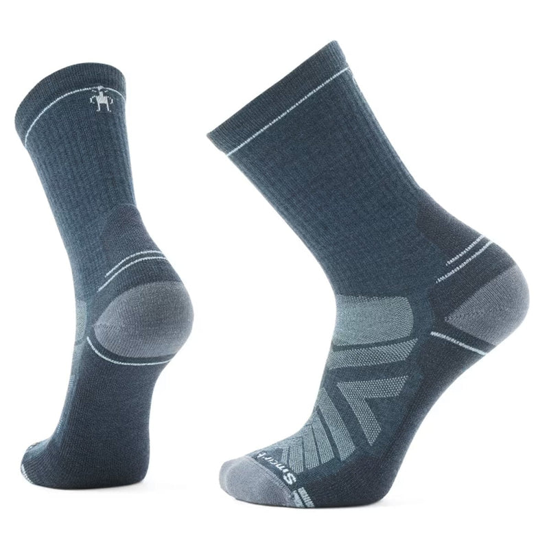 Load image into Gallery viewer, A pair of SmartWool Hike Light Cushion Crew socks in red and black, featuring a crew length and mesh zones on the side.
