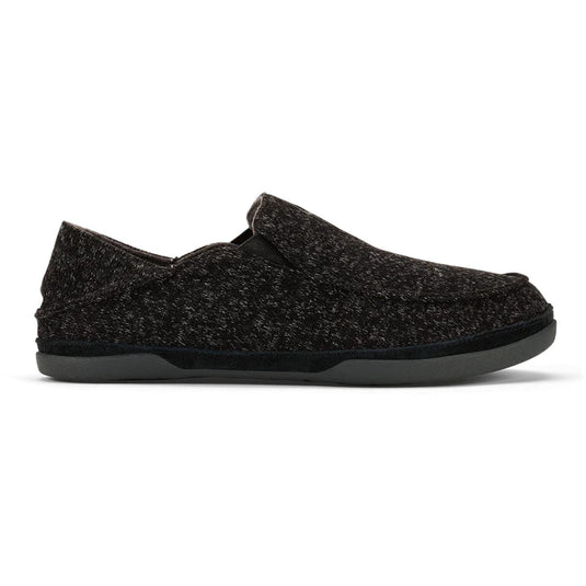 Black slip-on shoe on a white background