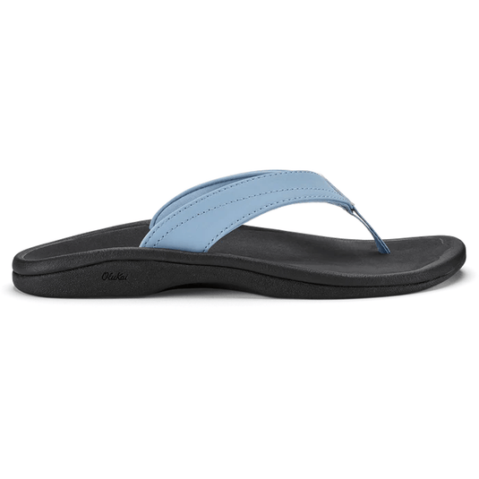 Blue sandal with black sole on a white background