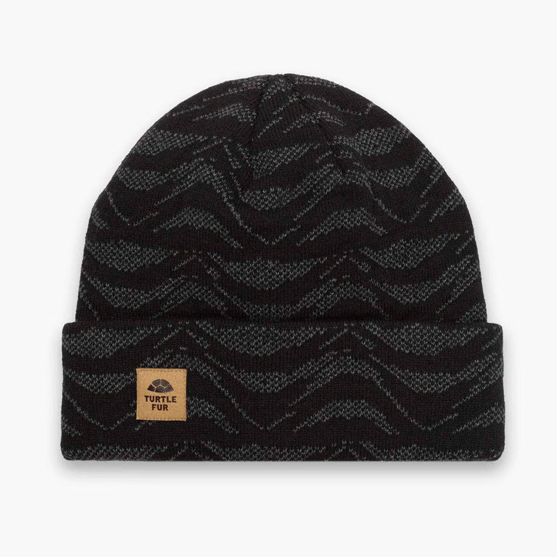 Load image into Gallery viewer, Black beanie with zigzag pattern and Turtle Fur label on a white background
