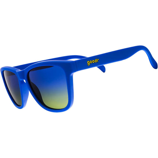 Blue sunglasses with gradient lenses on a white background
