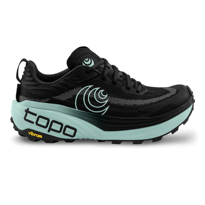 Load image into Gallery viewer, Black and teal running shoe with 'topo' branding on a white background
