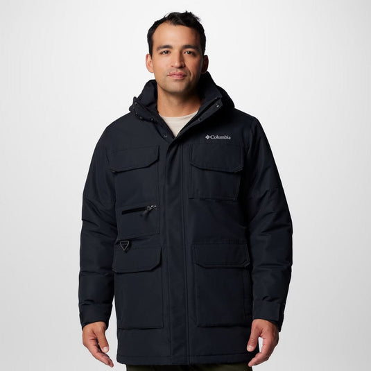 Man wearing a black Columbia jacket on a white background