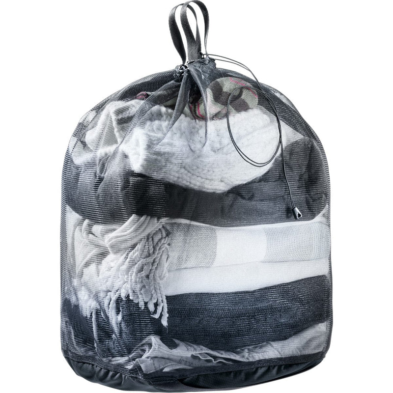 Load image into Gallery viewer, Mesh laundry bag filled with clothes on a white background
