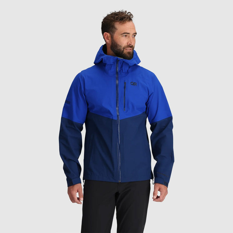 Load image into Gallery viewer, Man wearing a blue and navy jacket on a light gray background
